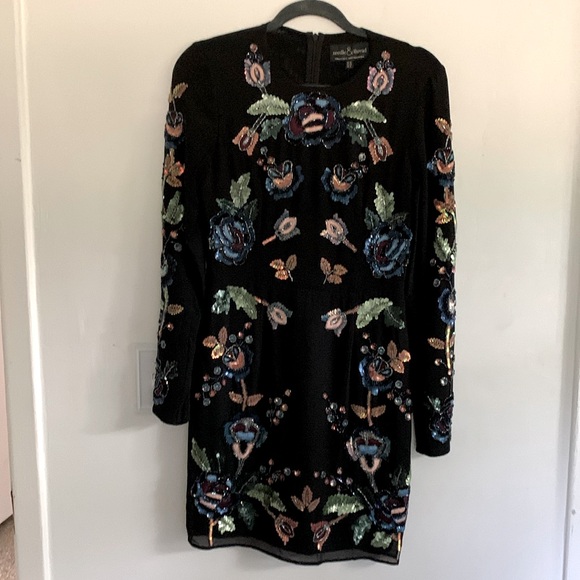 Long sleeved mini needle and thread black dress - Picture 1 of 3